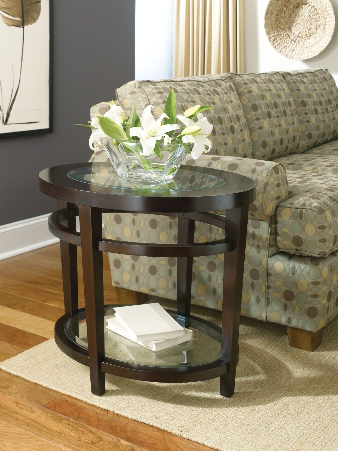 Hammary Urbana Oval Tempered Glass Top End Table is available in the